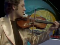 King Crimson, progressive, avant-garde, psychedelic rock band: David Cross in gold Malcolm Hall suit
