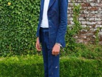 Model (Alex Stirling, who is a little small for the suit) in vintage denim Malcolm Hall suit, with small embroidered floral sprigs. Many thanks to Mark and Cleo Butterfield, of C20 Vintage Fashion, for their kind permission to use the image (taken at Port Eliot Festival, 2011)